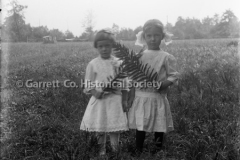 1449-Two-Girls-Holdi44BA54